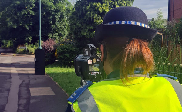 Officer with a speed gun