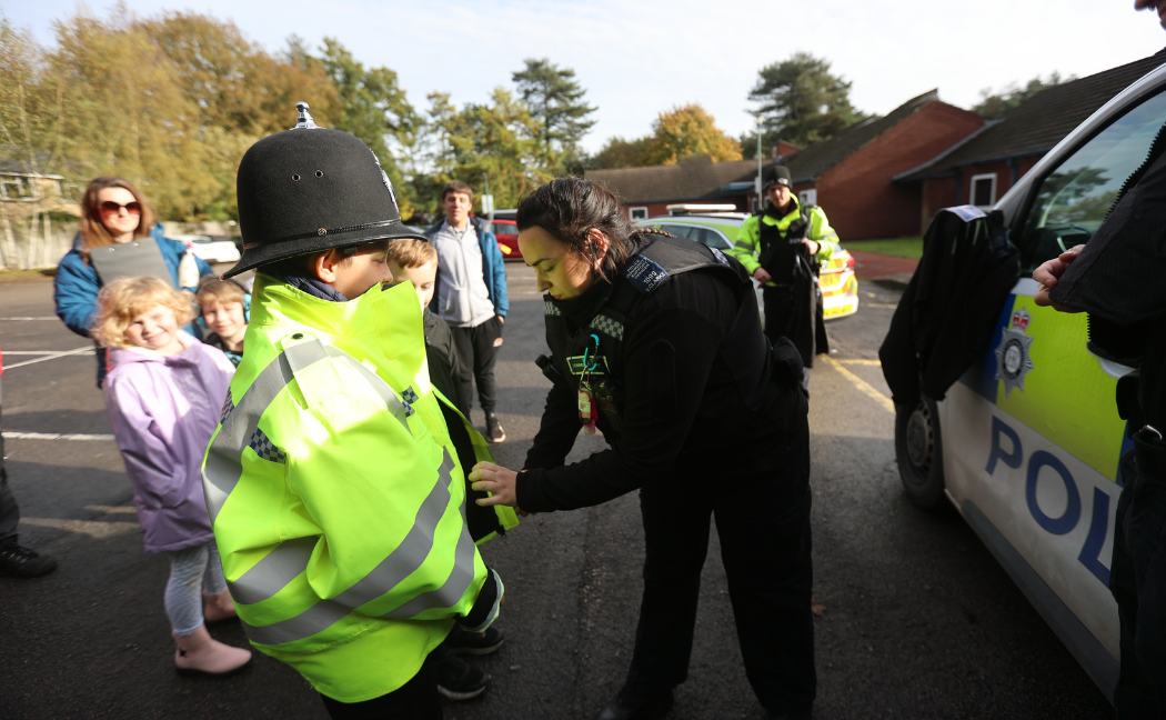 Officers engaging with children at Portland College