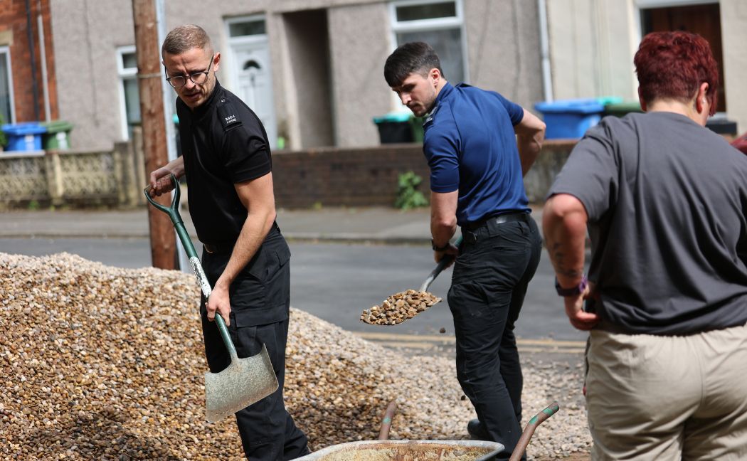 Officers helping out with gardening project