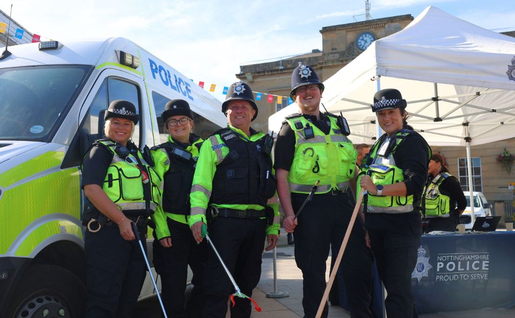 Officers taking part in Mansfield town centre clean up