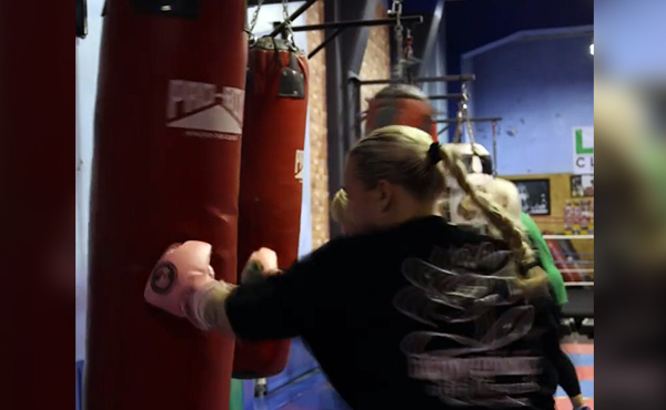 Girls taking part in a boxing session