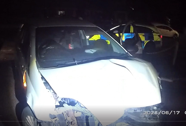 A damaged car which a drink driver drove into the frontage of a house