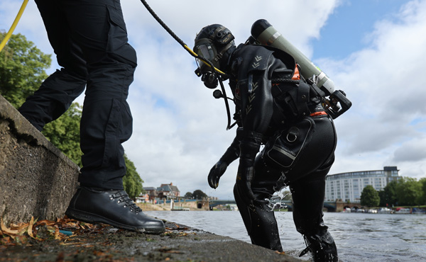 Diver emerging from the River Trent