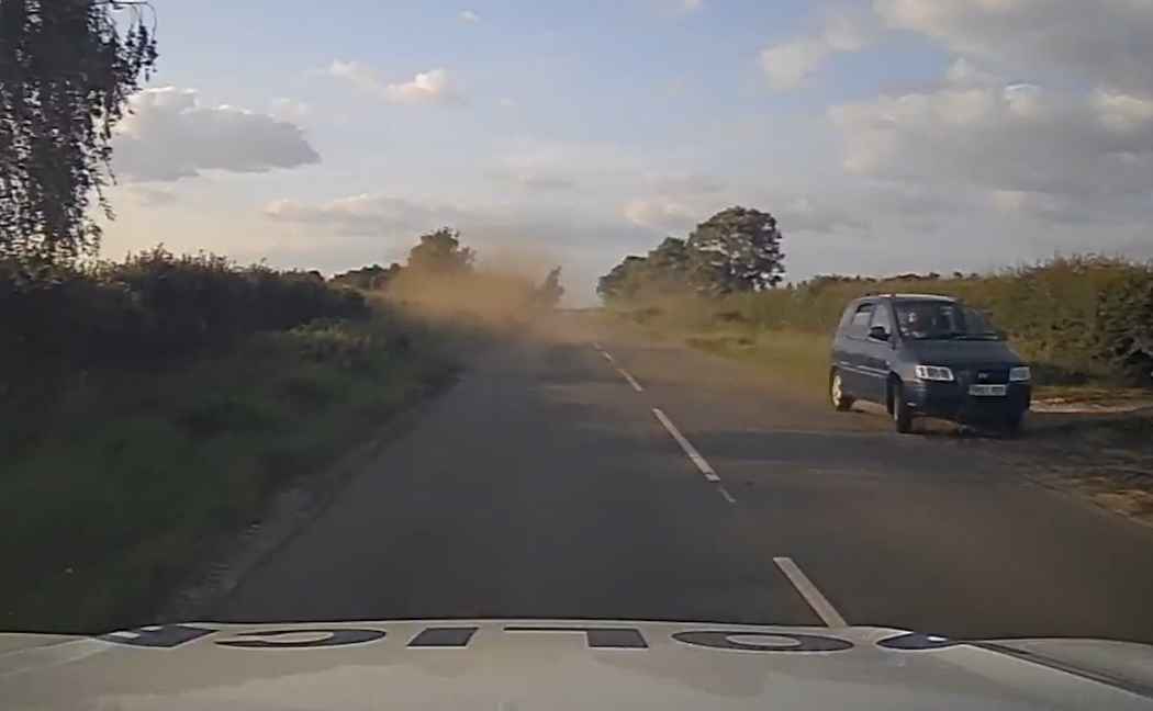 Car veers into a grass verge