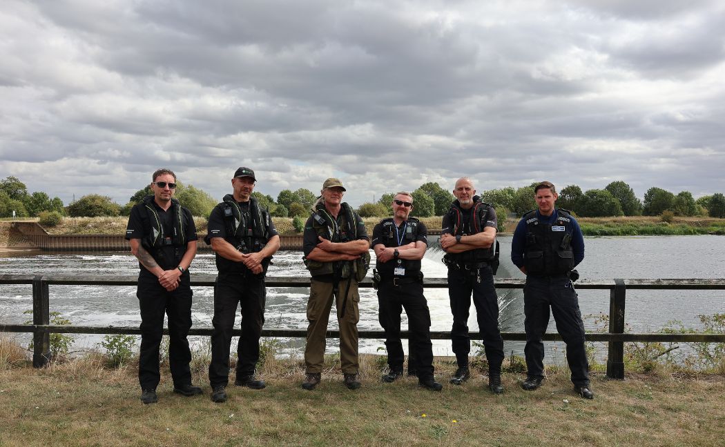 Officers in front of the River Trent