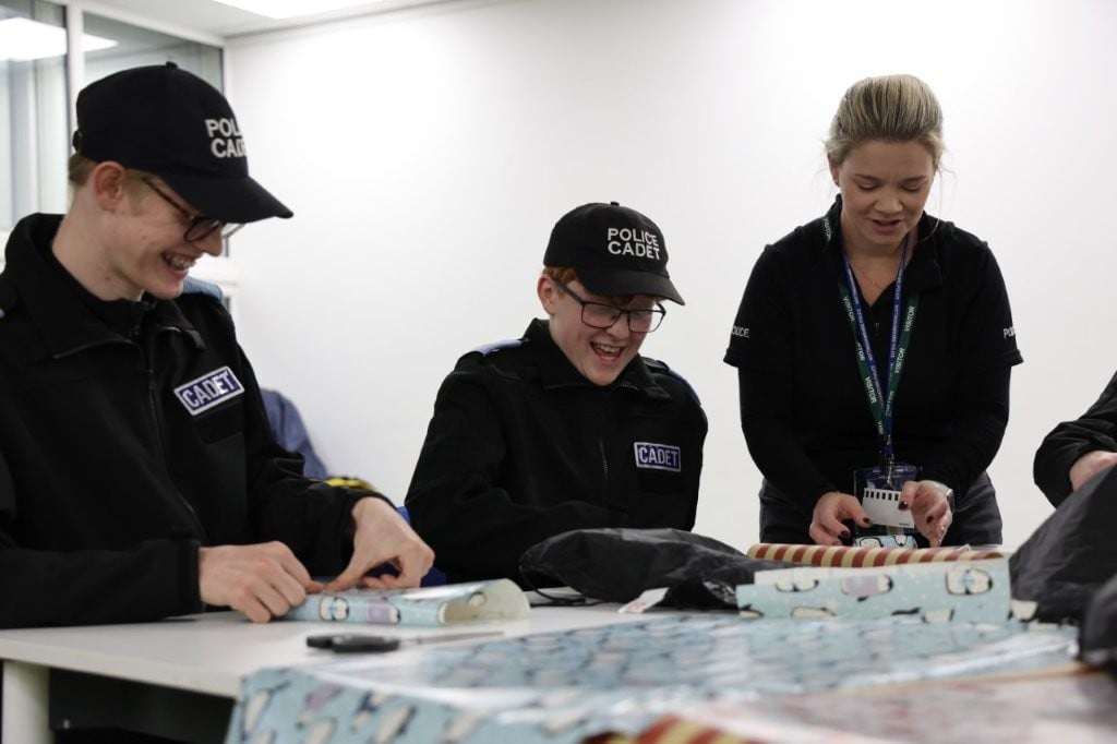 Police cadets wrap thousands of Christmas presents for underprivileged ...