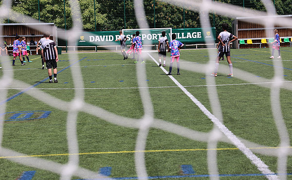 Young people playing football