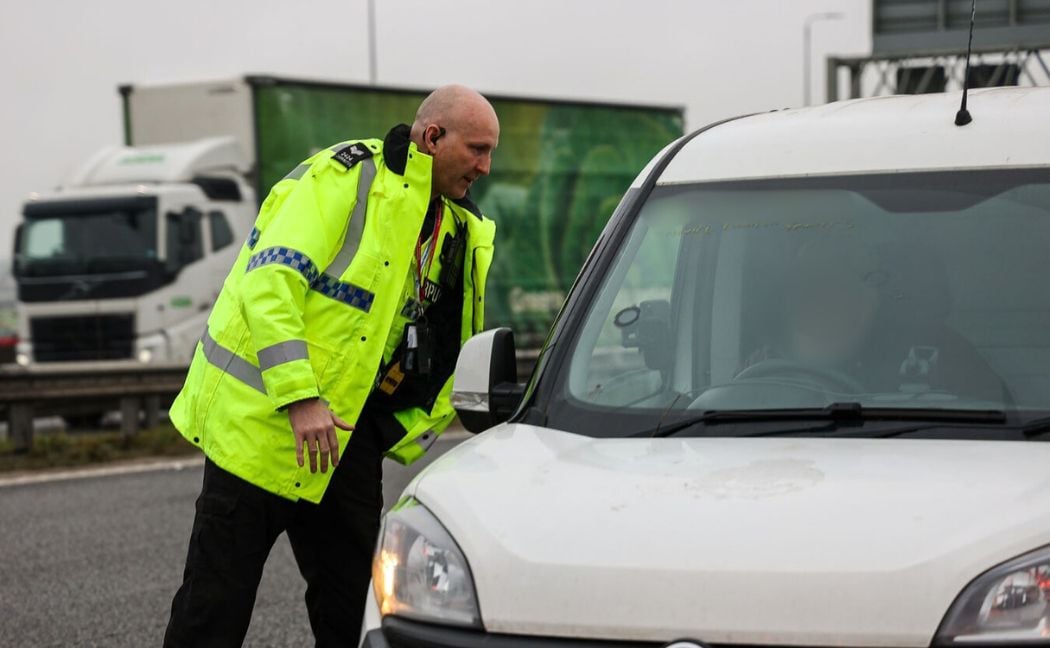 Jim Carrington making mobile phone stop