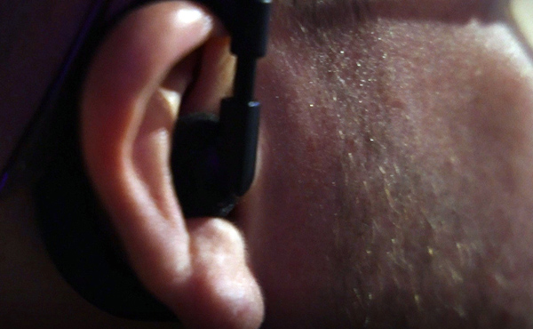 A police officer wearing an earpiece