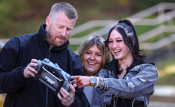 Students learning about how police officers use drones