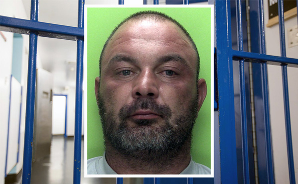 A custody photo of burglar Lukasz Furtak