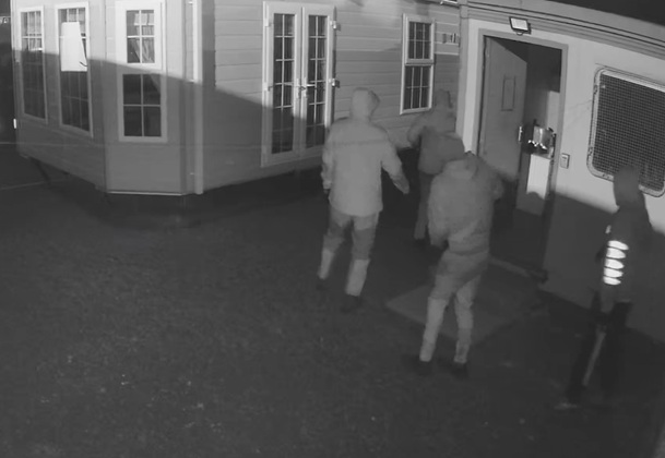 Op Hackney CCTV shows four intruders approach the mobile home.jpg