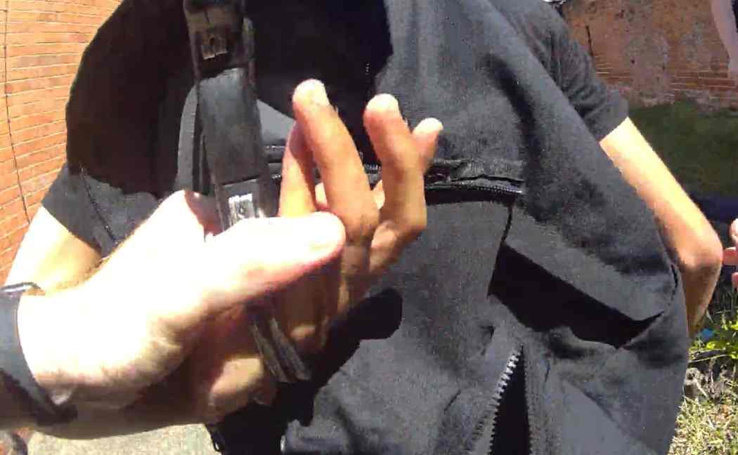 Suspect's hand held behind his back