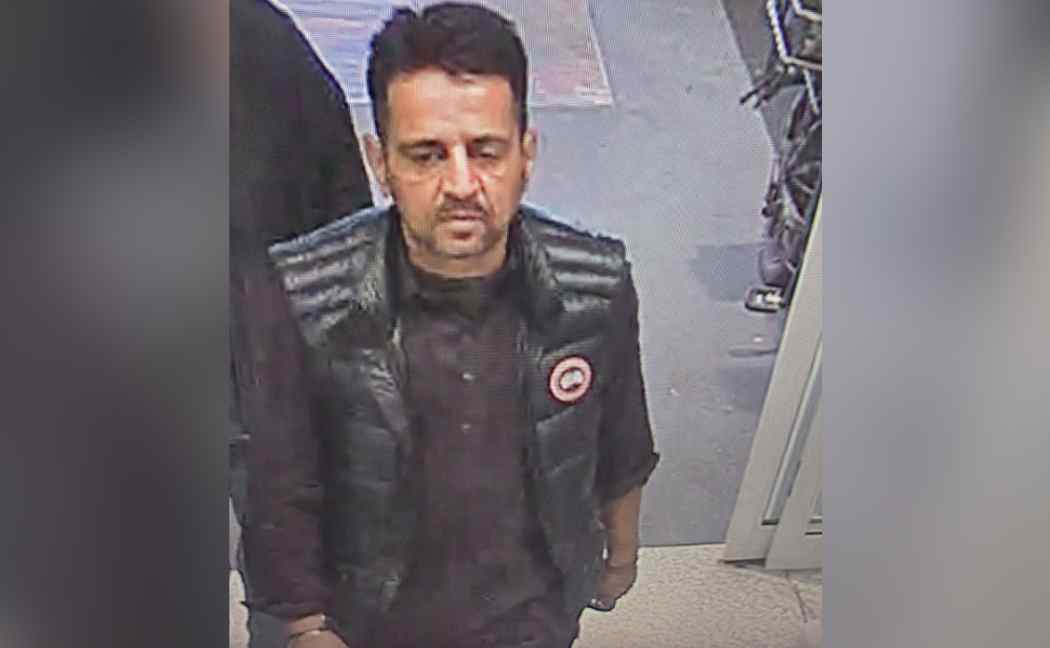 Man walking into shop