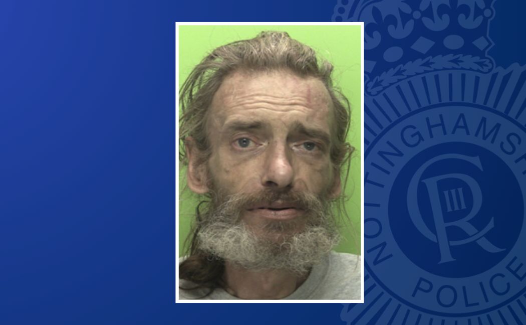 A custody photo of a wanted man police are trying to trace