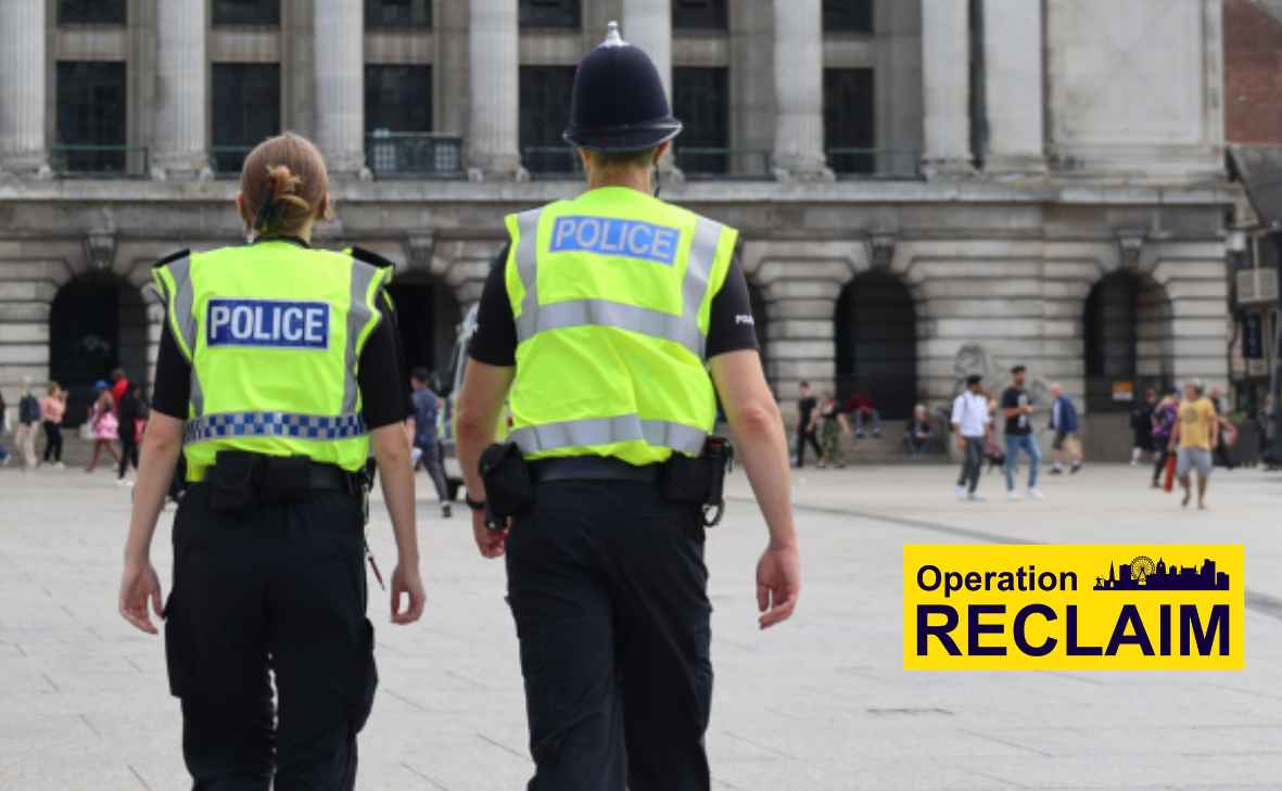 Two officers walking through Old Market Square