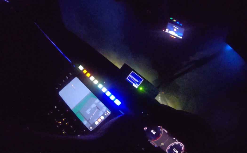 Inside a police car - dashboard shows car going at 106mph