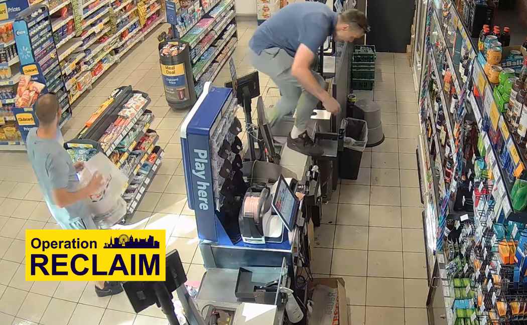 Carl Powell leaps over a counter, while Robert Preece-Smith holds a bag open