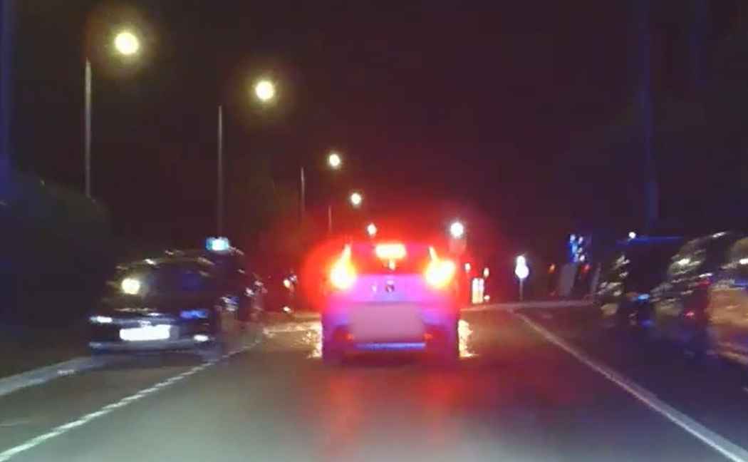 Sparks fly from under car during pursuit