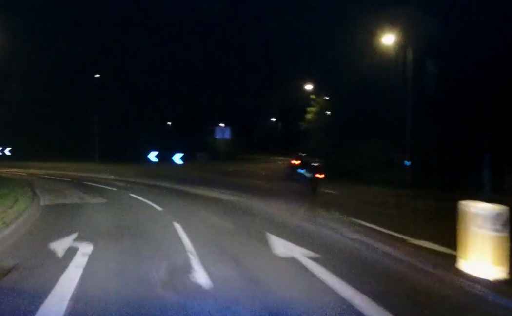 Car on two wheels after hitting central reservation 