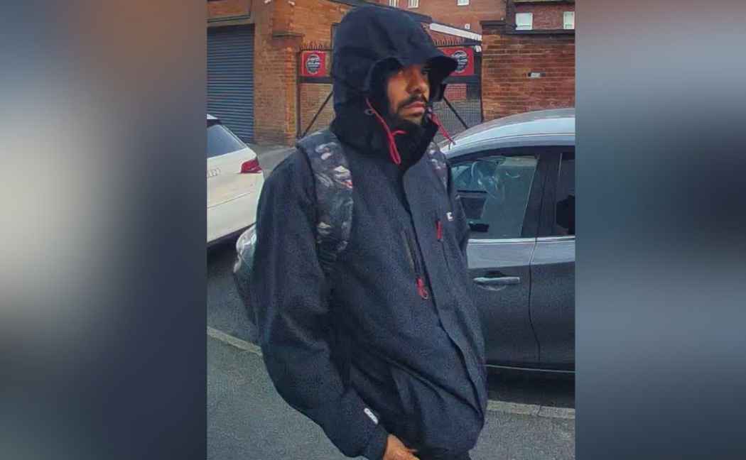 Man with hood up