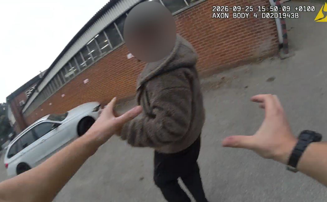 Police officer about to grab fleeing suspected drug dealer