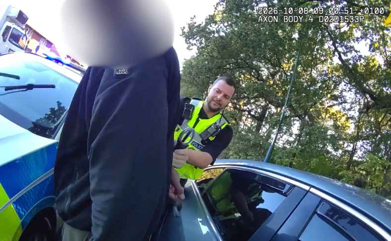 An officer arrests a suspect