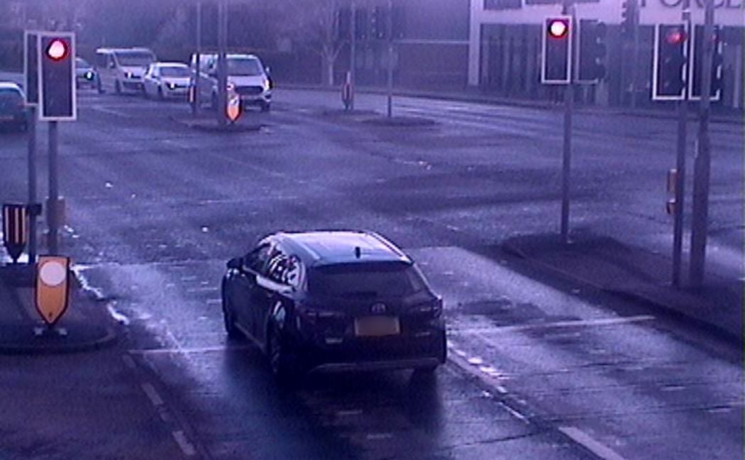 Taxi passing through red light